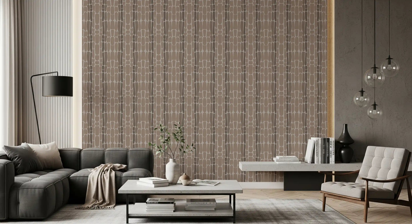 Cosy bedroom backed by earthy pebble mosaic wallpaper in soft taupe tones