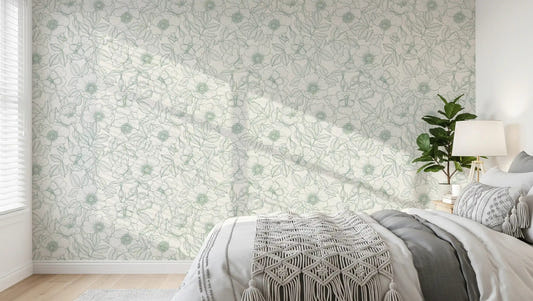 Bedroom dressed in Dog Rose and Butterflies green linework wallpaper