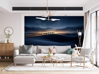 Living room backdrop showing Desert Odyssey wall mural with moonlit dunes