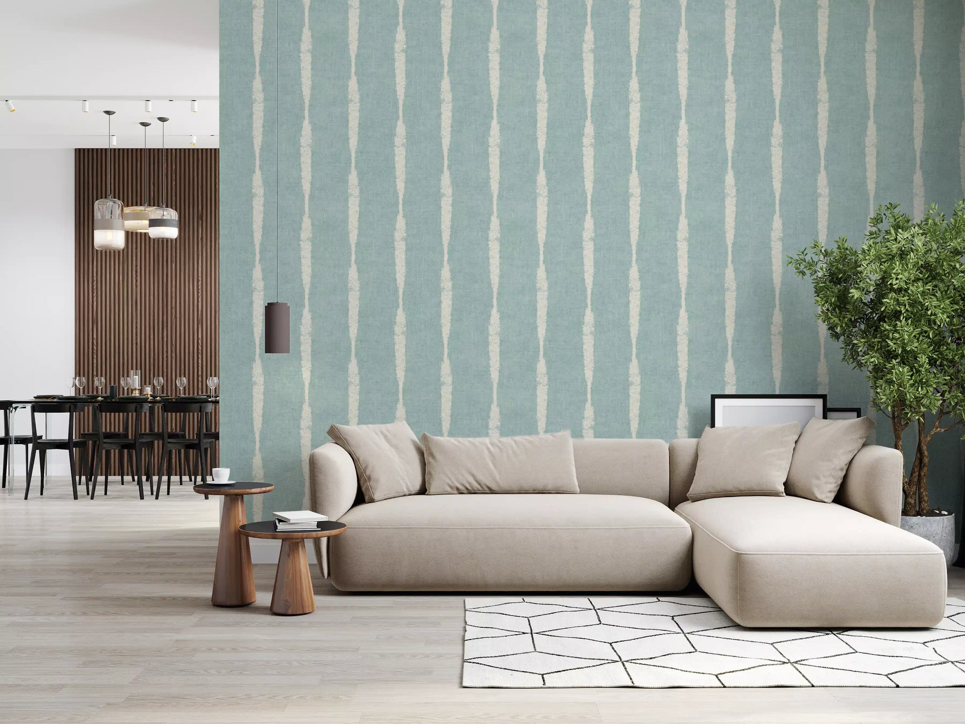 Spacious lounge area presenting a subtle cream textured wallpaper aesthetic.