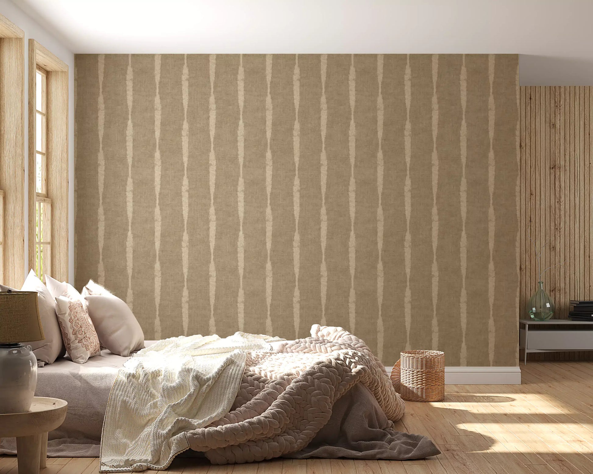 Tactile beige stripes wallpaper anchors a restful bedroom corner with worn charm.
