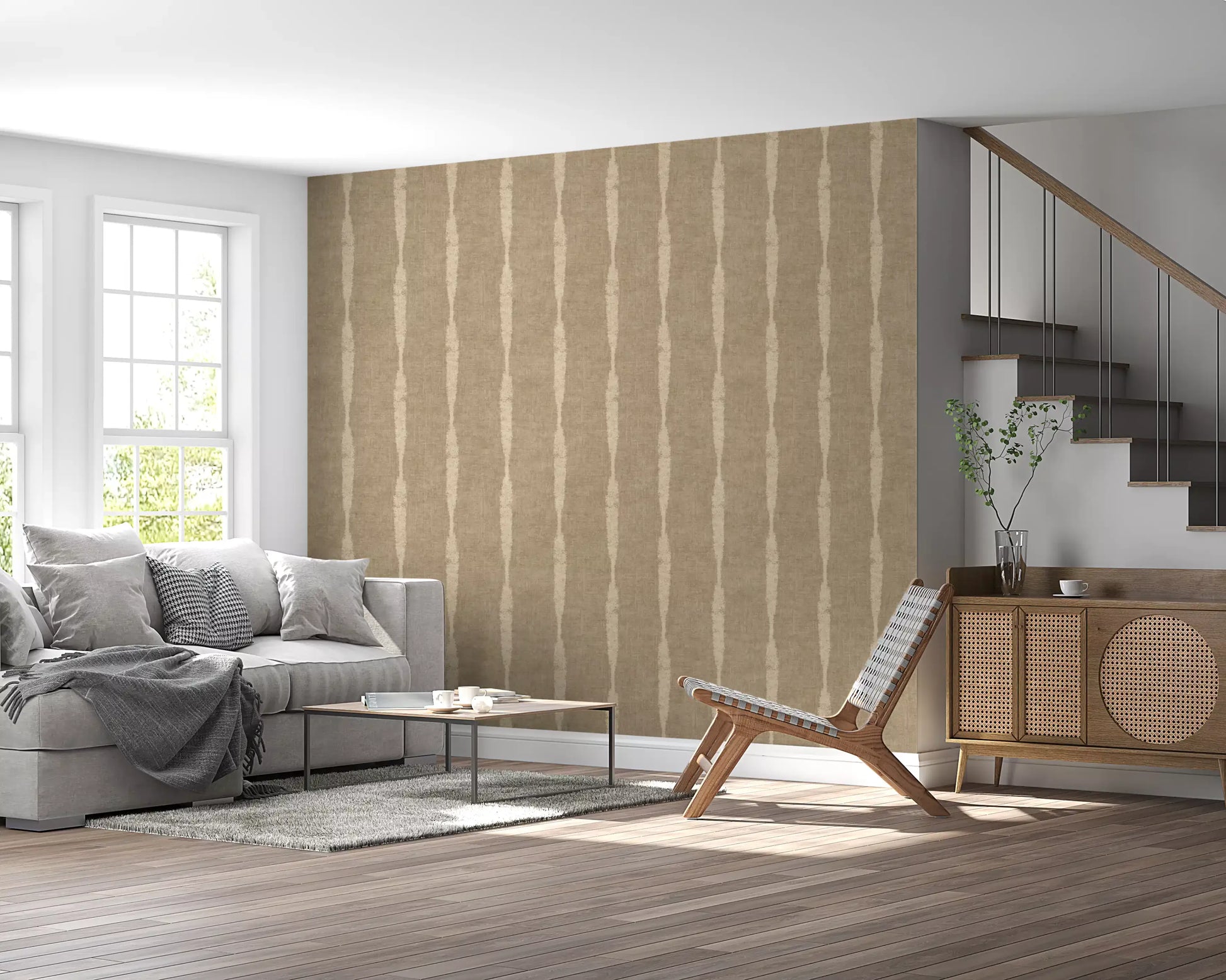 Distressed cream highlights run vertically along this warm beige stripes wallpaper.