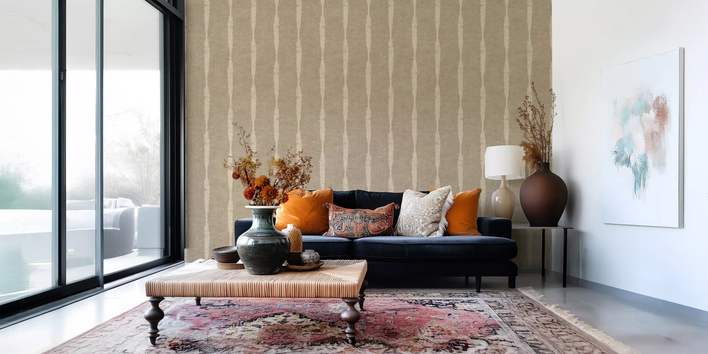 Vertical kaki stripes wallpaper with feathered beige edges and earthy grainy texture.