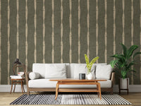 Cosy mood in this living room comes from chalky beige stripe wallpaper on green