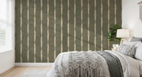 Drifting beige columns and muted green texture style this bedroom in stripe wallpaper