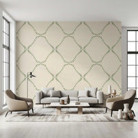 Repeating diamond outlines give this green dotted wallpaper a calm rhythm