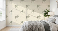 Open oatmeal linen surrounds each palm in this beachy boho wallpaper