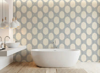 Slate blue mosaic wallpaper keeps a bright bathroom calm and fresh