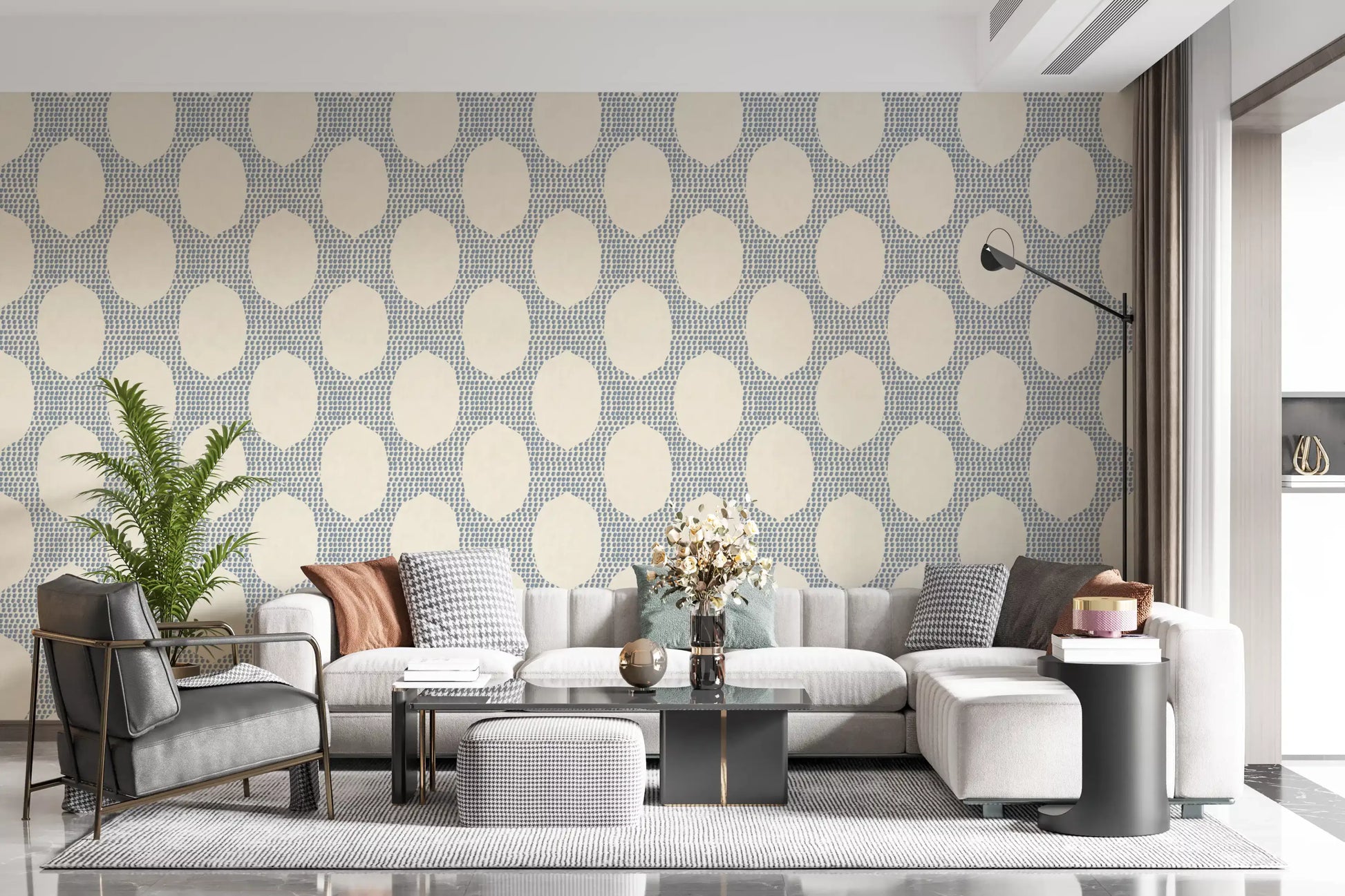 Stippled blue dots add quiet structure to a sitting room in wallpaper