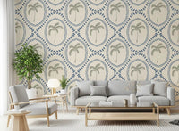 Beachy boho palm oasis wallpaper sets a calm slate-blue tone across this living room