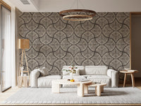 Cozy living room lounge accented by the repeating cream fan shape wallpaper.
