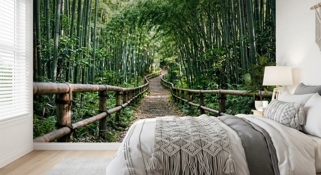 Tall green bamboo calms this bedroom through a serene forest wall mural scene.
