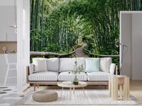Green bamboo and a forest path give this lounge a restful wall mural backdrop.