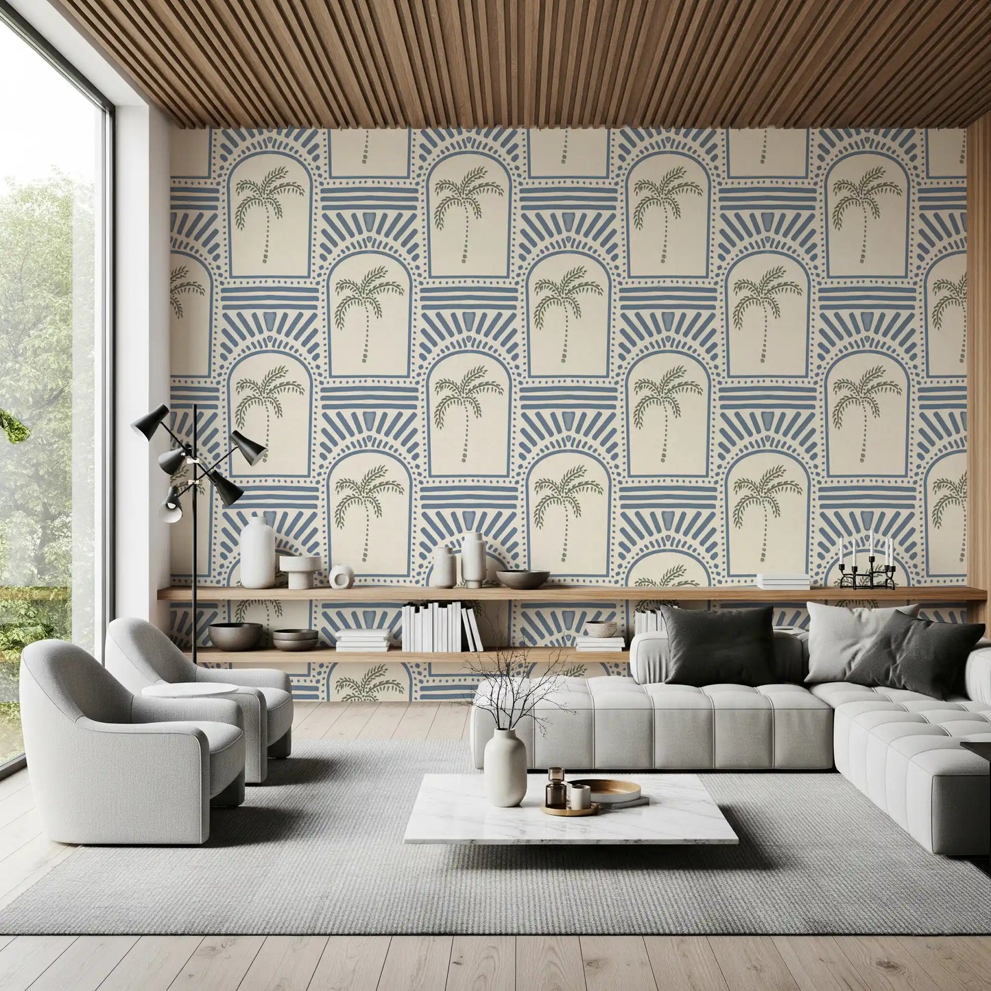 Tropical palm art deco archways slate blue wallpaper inside a modern living room.