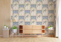 Minimalist lounge area bordered by the stylized blue Tropical Palm wallpaper.