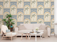 Tropical Palm Art Deco Archways Sand & Slate Blue Wallpaper in a bright living room.