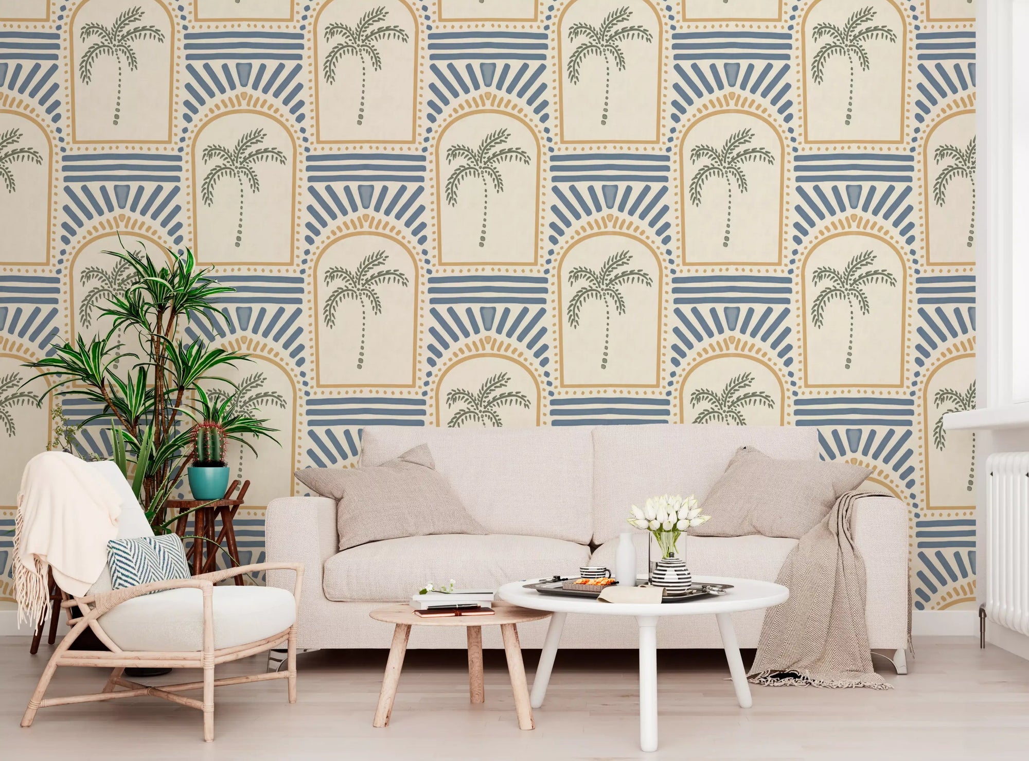 Tropical Palm Art Deco Archways Sand & Slate Blue Wallpaper in a bright living room.