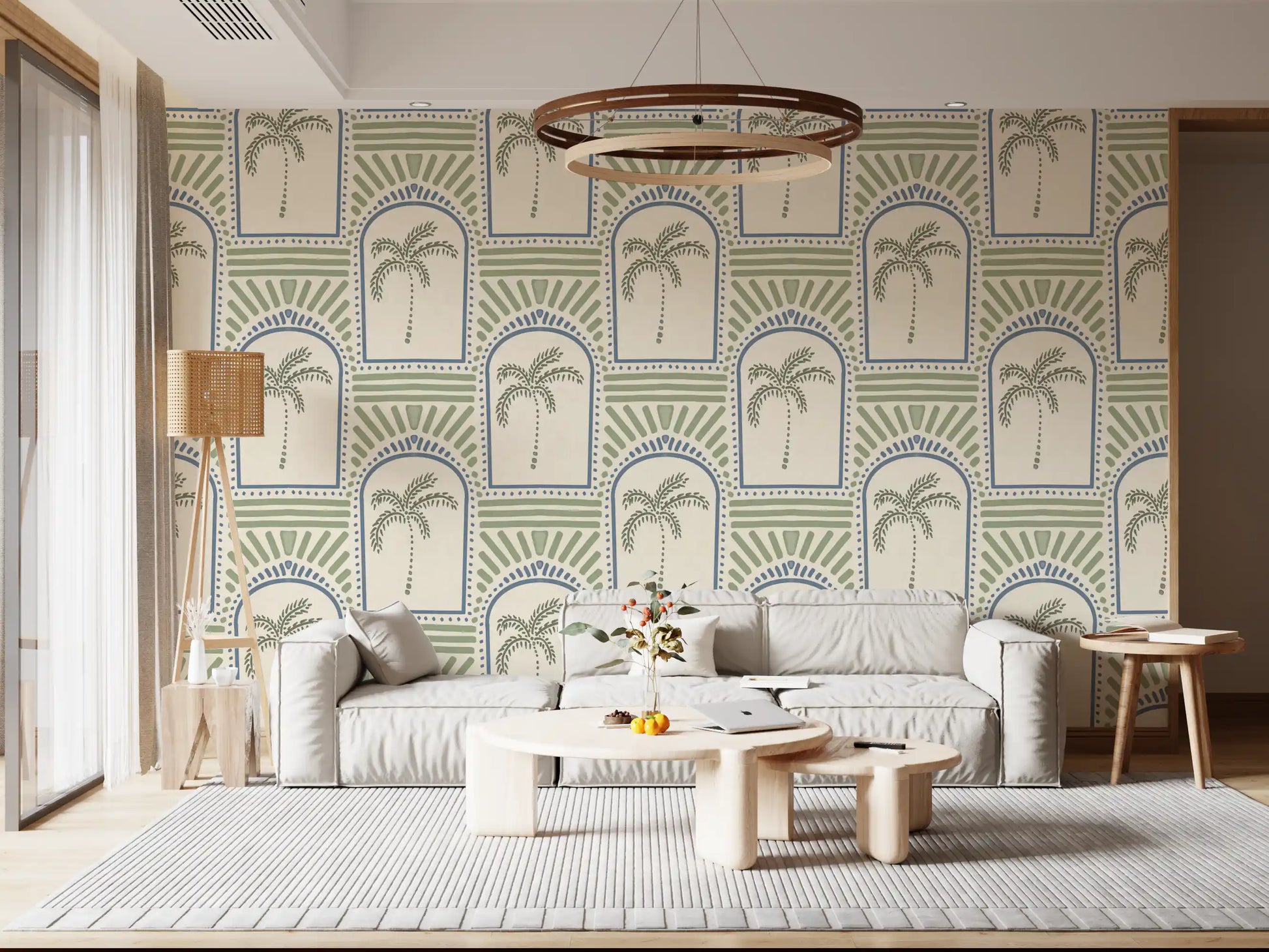 Lounge area highlighting the Tropical Palm Art Deco Archways Slate Blue & Costal Green Wallpaper