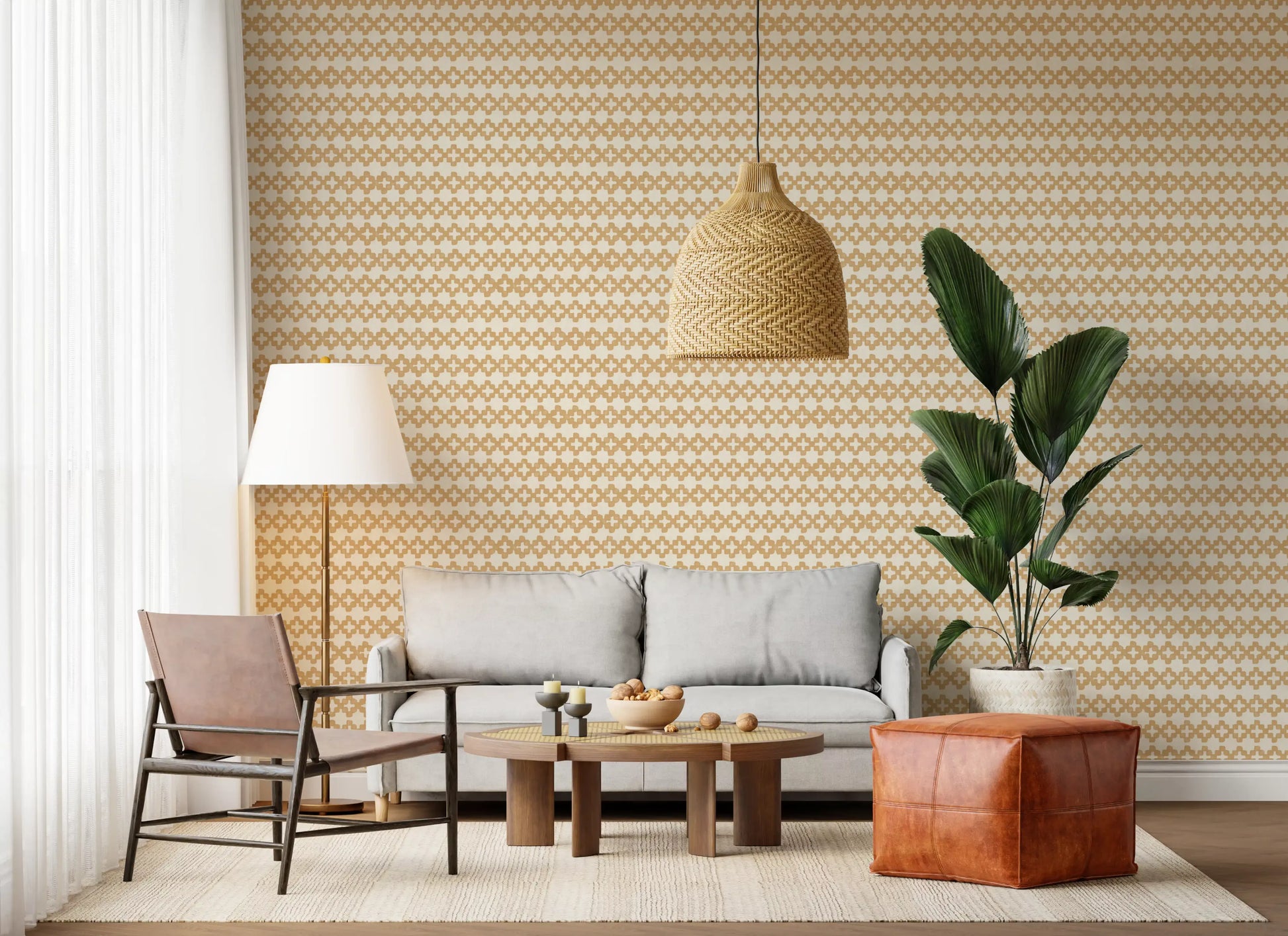 A bright living room layered with warm Zellige Cross Sand wallpaper tones.