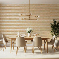 Warm dining room paired with the Zellige Cross Sand wallpaper's plus motifs.