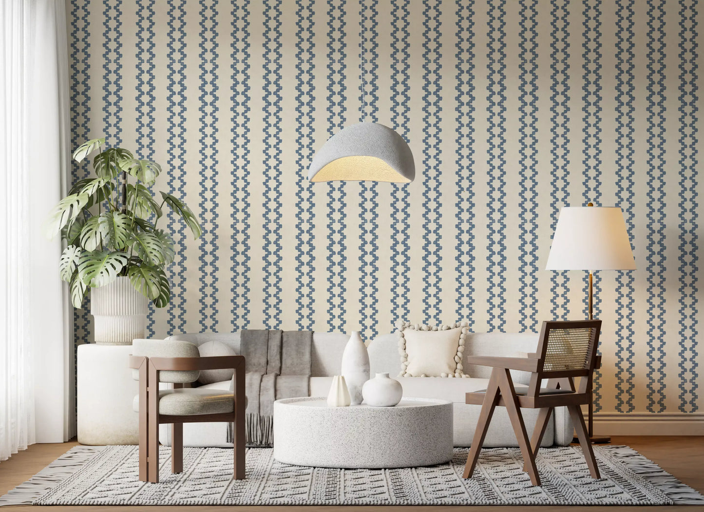 A serene Hallway lined with zellige striped wallpaper in slate blue