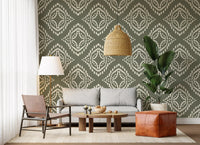 Canvas-textured boho wallpaper showing a symmetrical palm green ornament motif