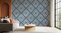 Nested diamonds set a rich block print canvas wallpaper across this lounge