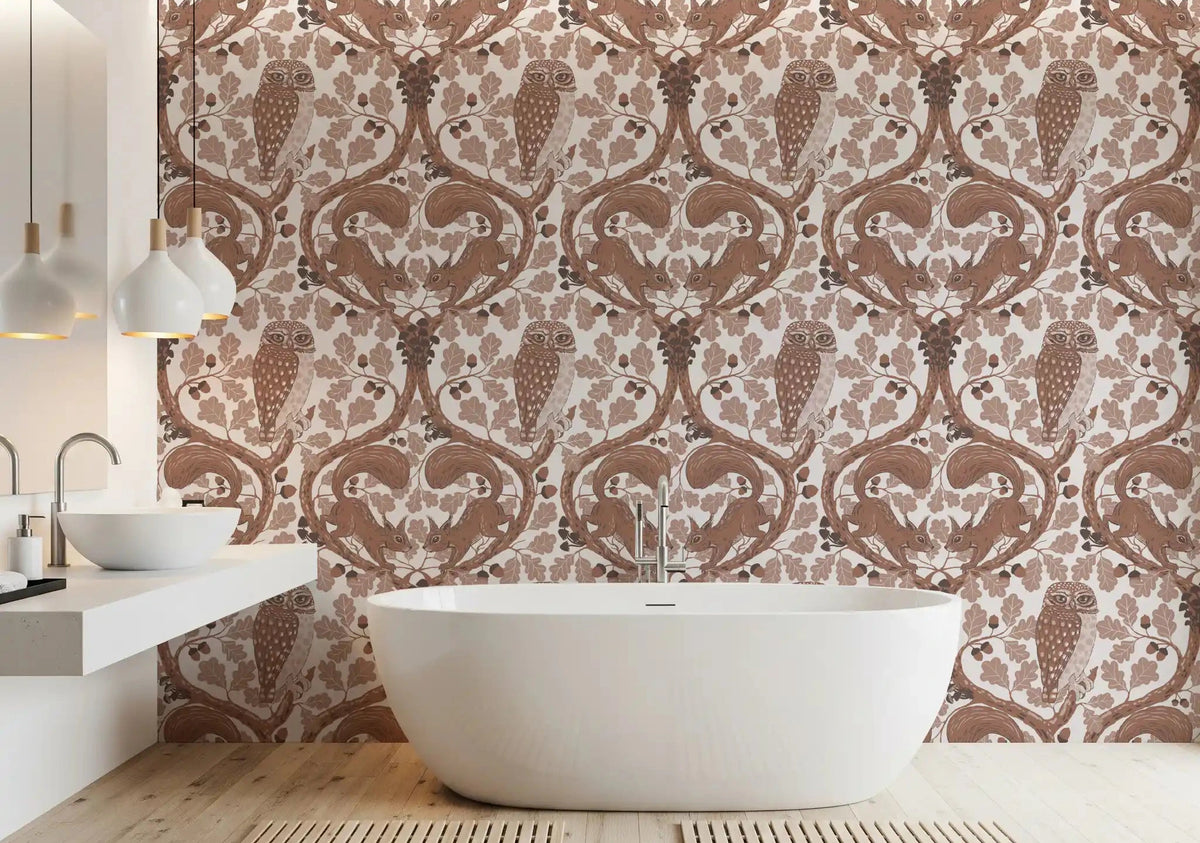 Woodland owl and squirrel wallpaper styling a calm, spa-like bathroom