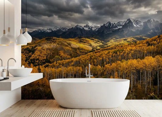 Stormy peaks and gold foliage fill a bathroom via Golden Embrace wall mural