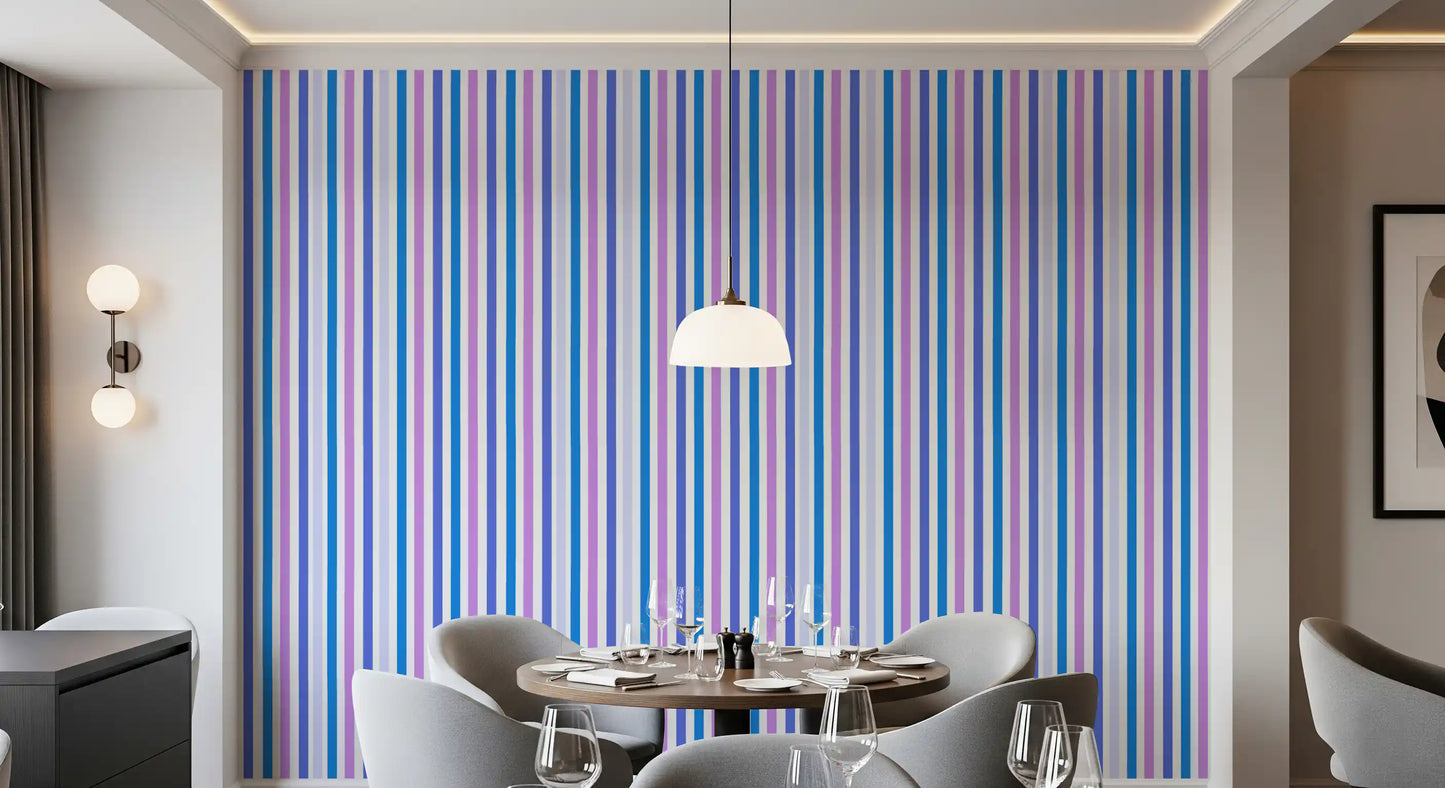 Dining room paired with vertical blue and lilac stripe wallpaper for a clean feel