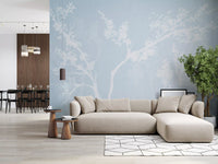 Ethereal Blue Blossom wall mural shows white branches in a misty haze.