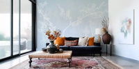 Quiet calm reaches a Living room via this Ethereal Blue Blossom wall mural.