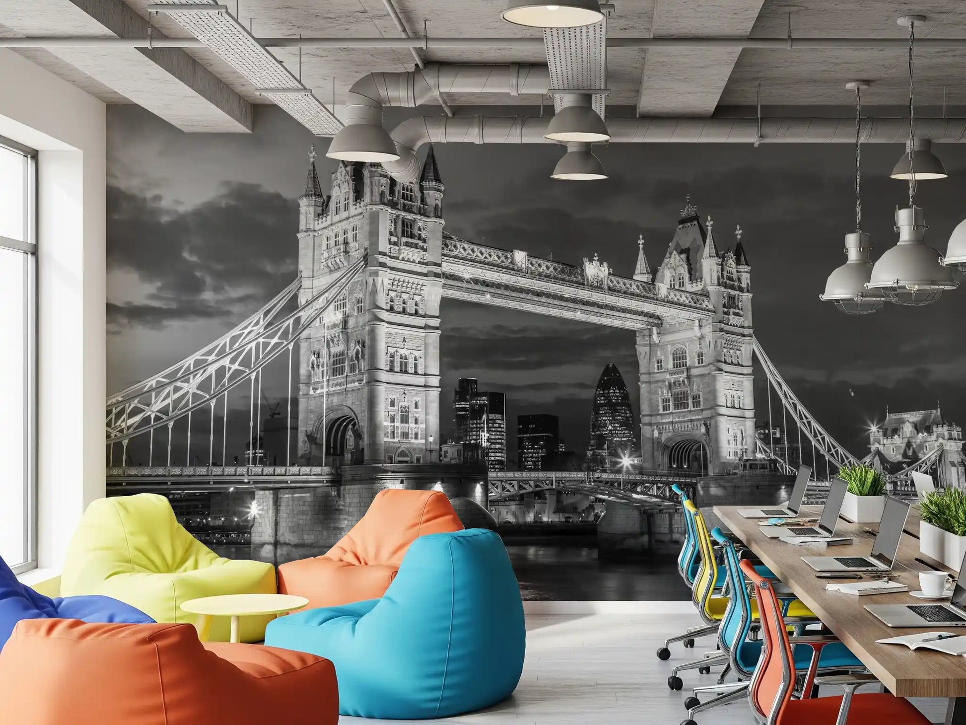 Open Home office work space backed by a monochrome London wall mural
