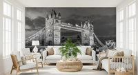 A lit London bridge scene gives a Living room a moody focal wall mural