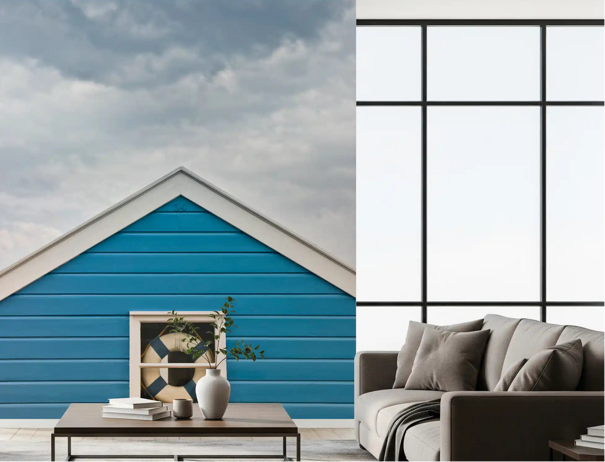 Breezy coastal mood fills a living room with the Blue Beach Hut wall mural
