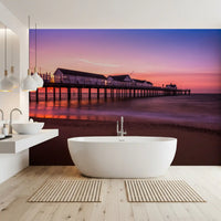 A calm sea reflects the dusk sky in the Pier Reverie wall mural.