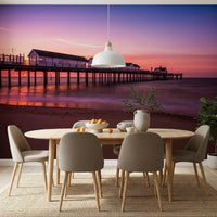 Rose and lilac light glows low on this Sunset Pier wall mural horizon.