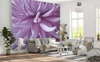 Living room styled around a luminous purple bloom wall mural