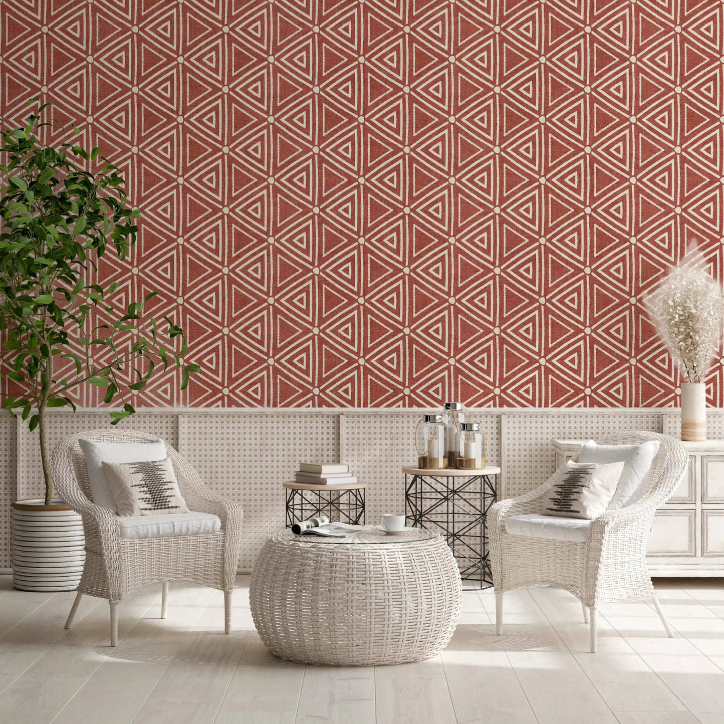 Repeating triangle mudcloth wallpaper framing a relaxed lounge
