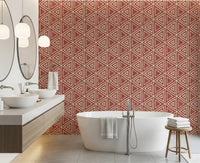 Terracotta mudcloth triangle wallpaper warming a clean bathroom