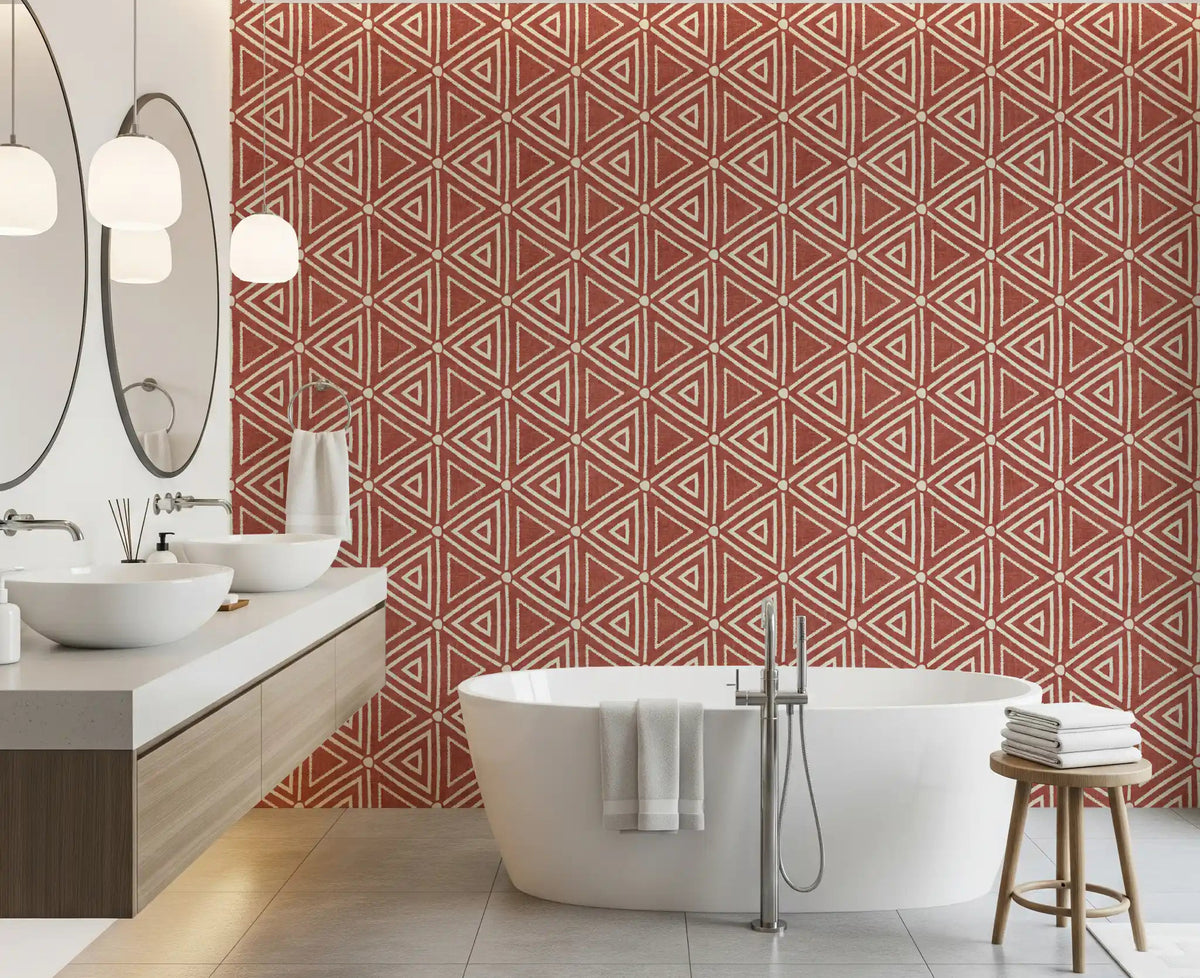 Terracotta mudcloth triangle wallpaper warming a clean bathroom