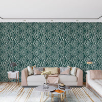 Cream outlines ring each triangle against the teal ground of this Mudcloth Boho wallpaper