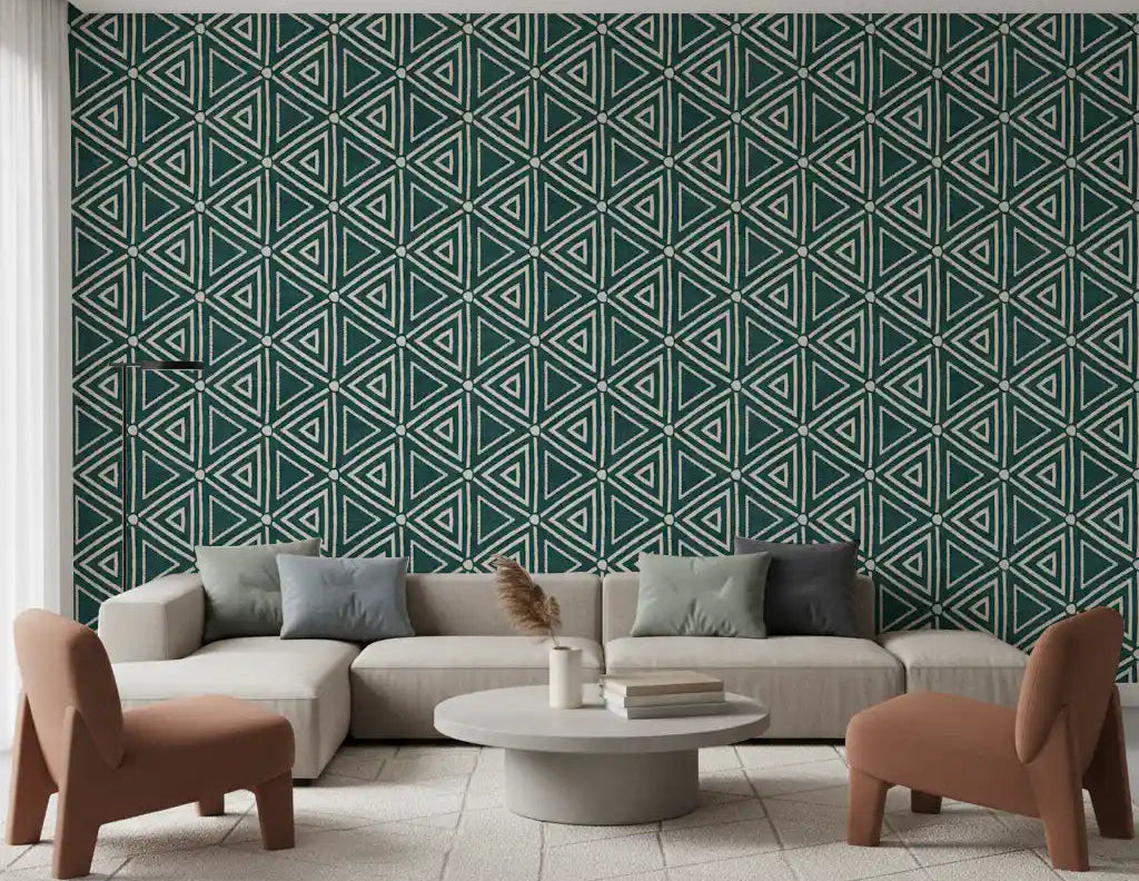 Nested teal triangles wrap a calm living room in Mudcloth Boho wallpaper