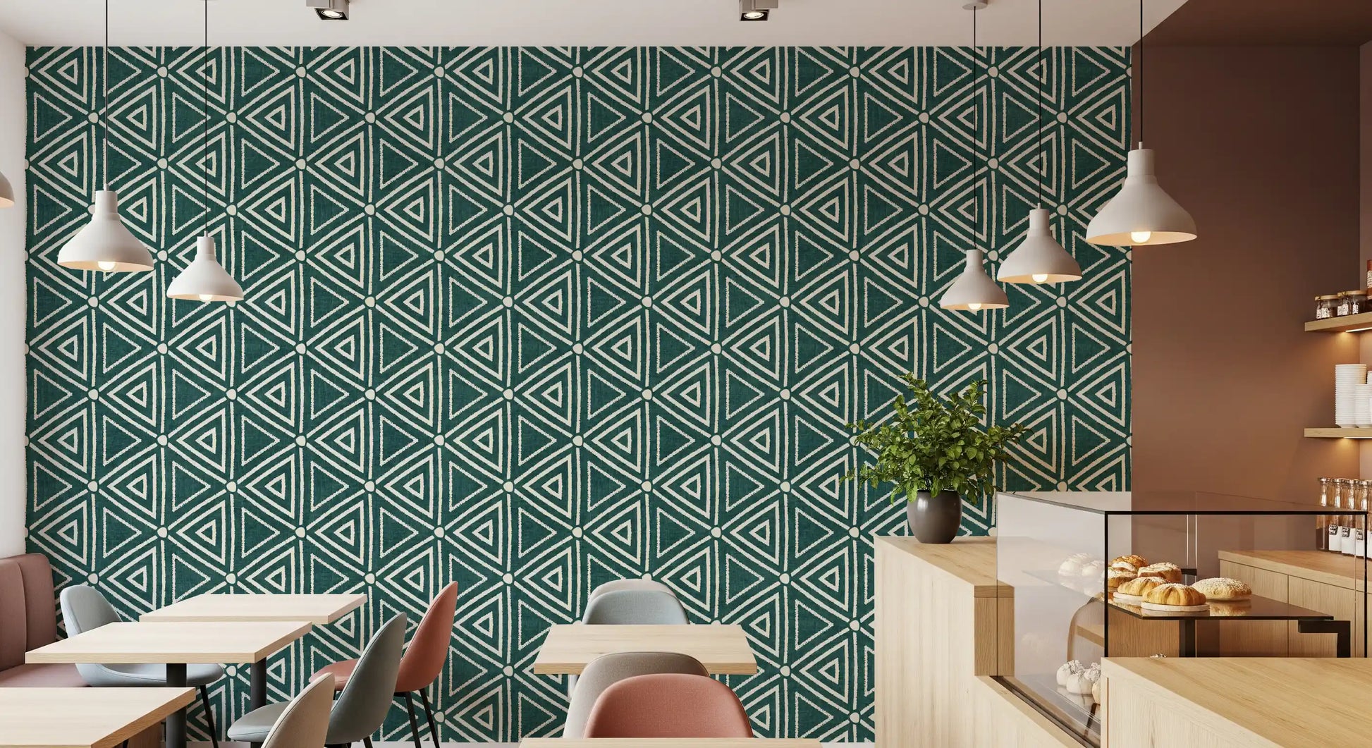 Earthy teal moves a narrow Restaurant along, with Boho Triangles wallpaper guiding the eye