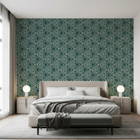 Concentric triangles tile a deep teal field in the Mudcloth Geometric Boho wallpaper