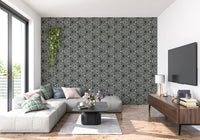 Stepping into an entryway, boho mudcloth wallpaper sets a moody, handcrafted tone
