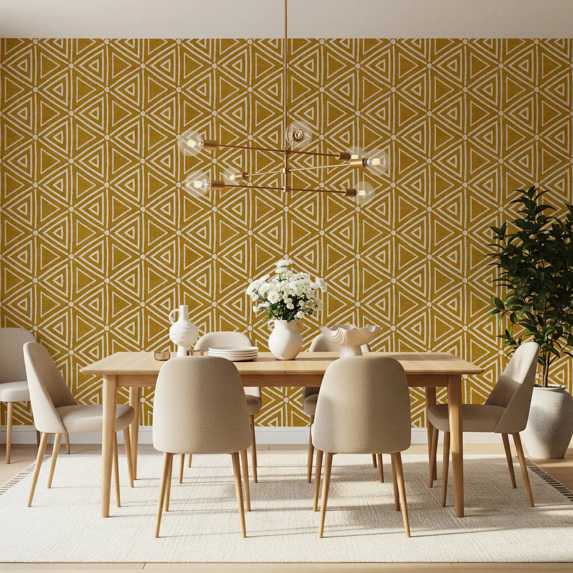Geometric triangle repeats fill a quiet Dining room in mustard mudcloth wallpaper