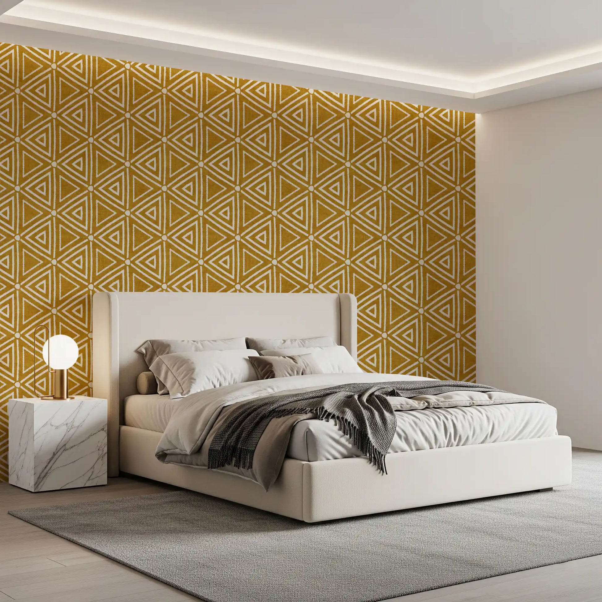 Ivory linework edges each triangle on this boho mustard mudcloth wallpaper