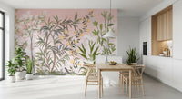 Blush pink garden scene spreads behind a calm dining room in this wall mural
