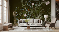 Pink peonies and birds climb a botanical wall mural set over a living room